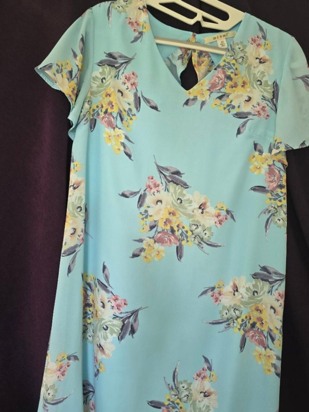 XS "Miami" light blue floral dress with flutter sleeves and cutout ruffle back